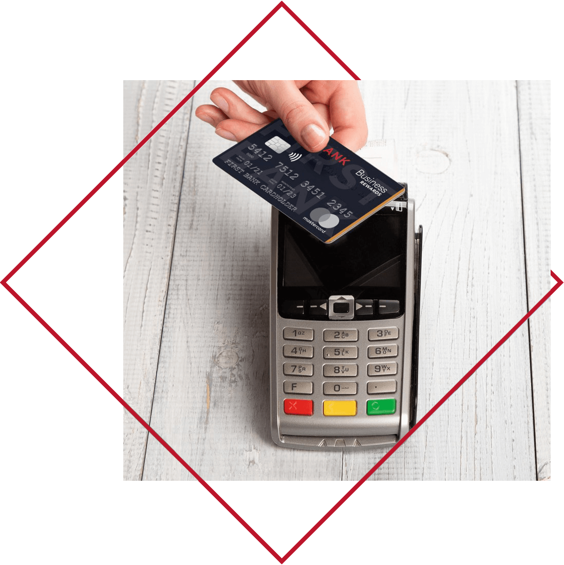 Ariston Credit Union Credit Card with Rewards being used on touchless payment pad.